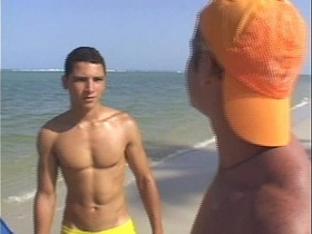 Hot gay threesome fucking on the beach